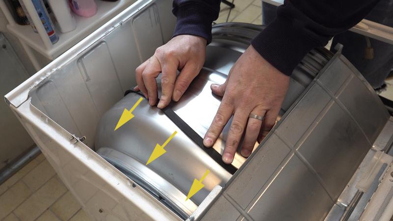 Riemen von der Trommel schieben