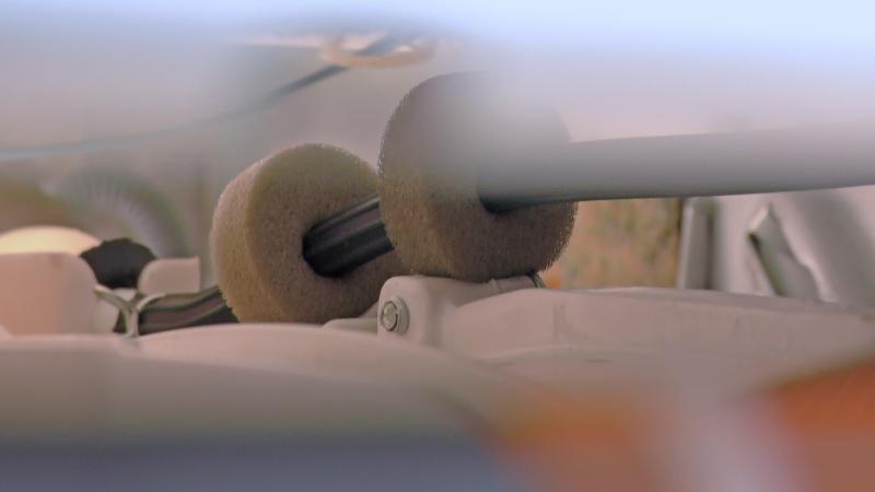 Schlauchschutz positionieren Schlauchschutz positionieren